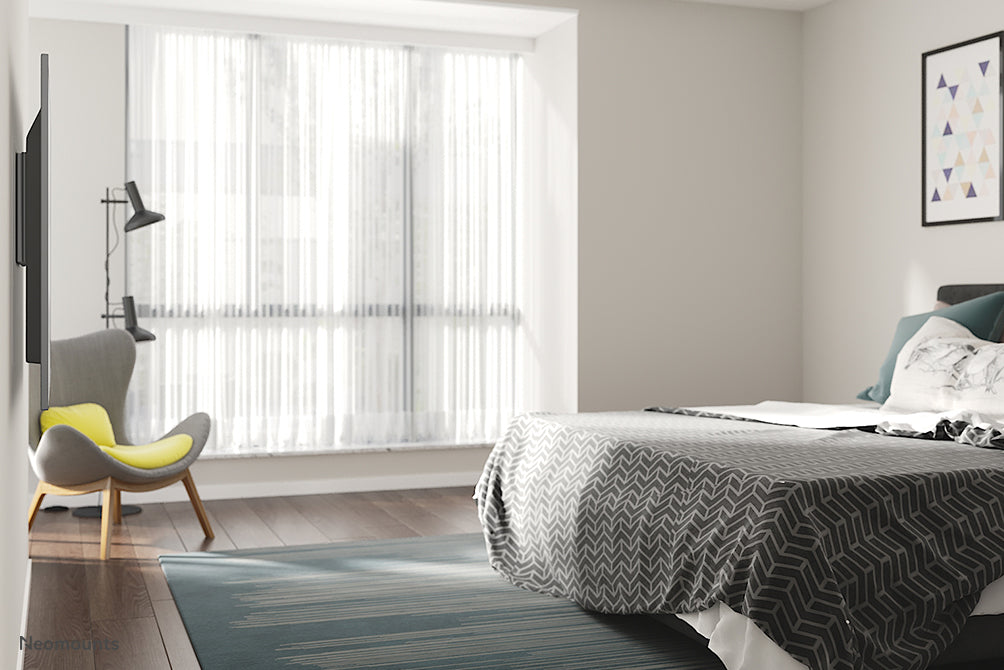 Neomounts FPMA-W110 noir est un support mural plat pour écrans plats jusqu'à 40 pouces (102 cm).