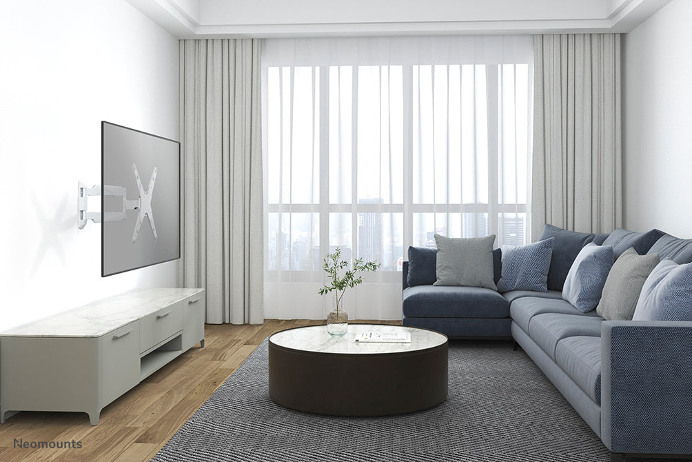 Neomounts NM-W440 blanc est un support mural avec 3 points de rotation pour écrans plats jusqu'à 55 pouces (140 cm).